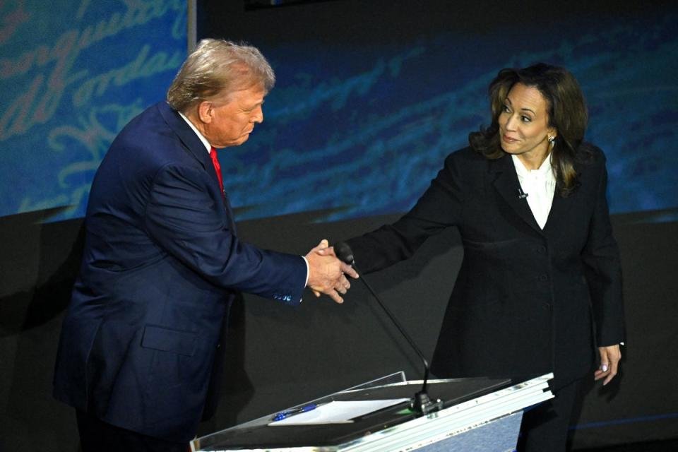 Kamala Harris shakes hands with Donald Trump before a debate on September 10 in Philadelphia (AFP via Getty Images)